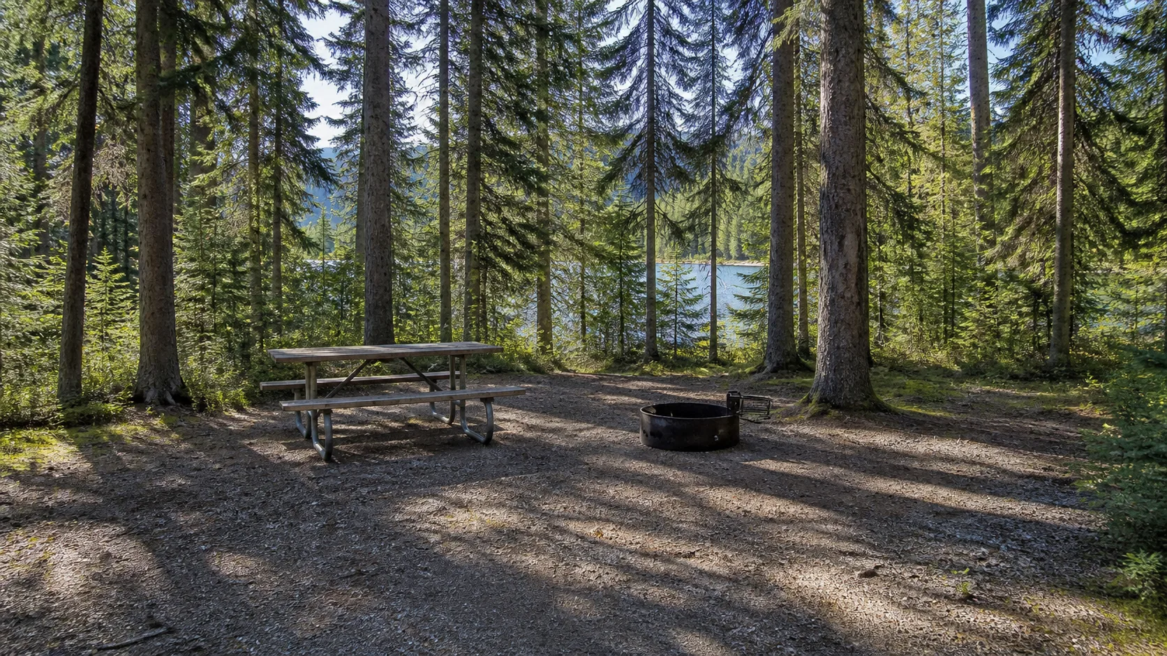 A shaded vehicle-accessible campsite at the Bowron Lake Campground