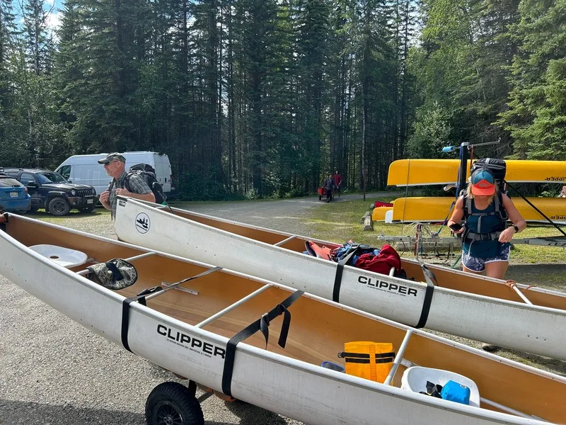 Clipper rental canoes on their carts at the Bowron Lake trailhead, ready to be collected
