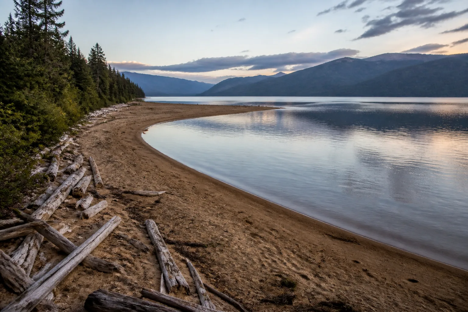 The long sandy beach at Pat's Point, between Spectacle and Swan Lakes